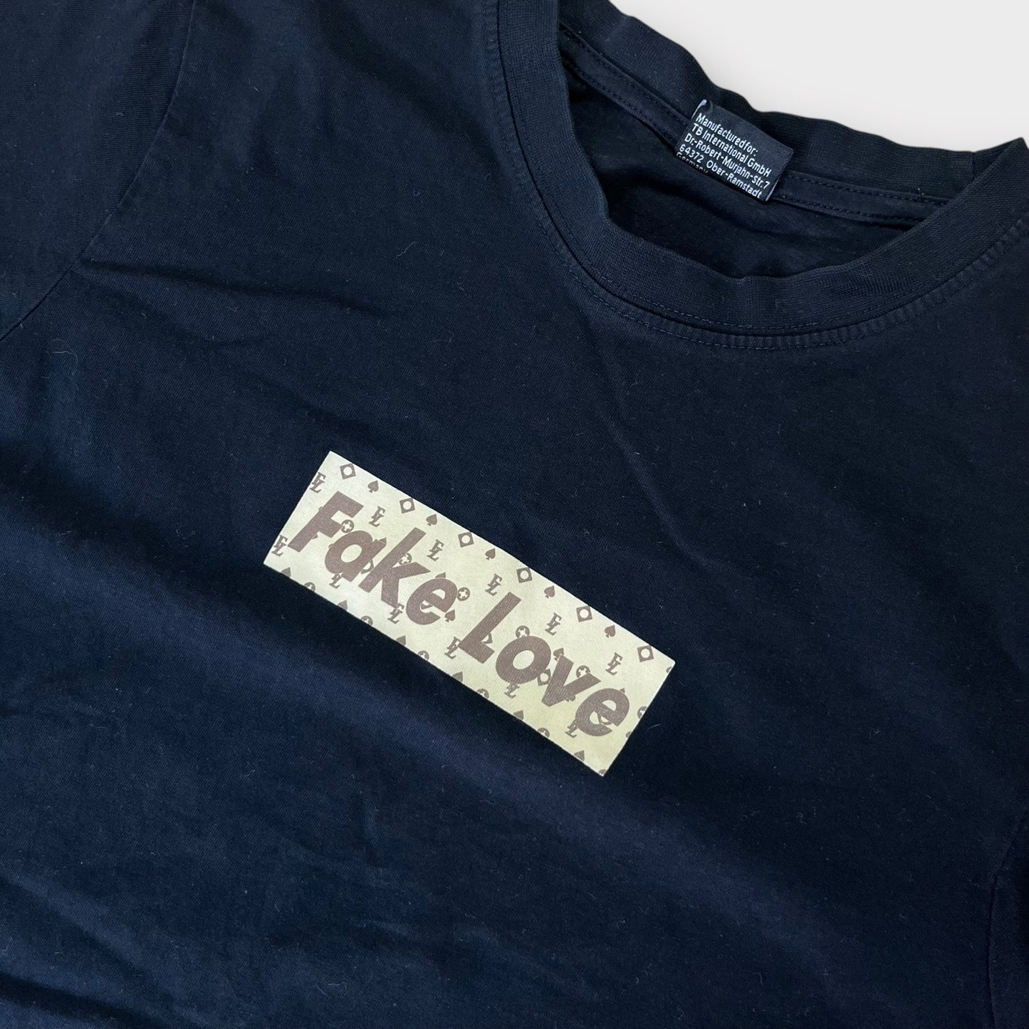 Mister Tee “Fake Love” Box Logo Graphic T-Shirt