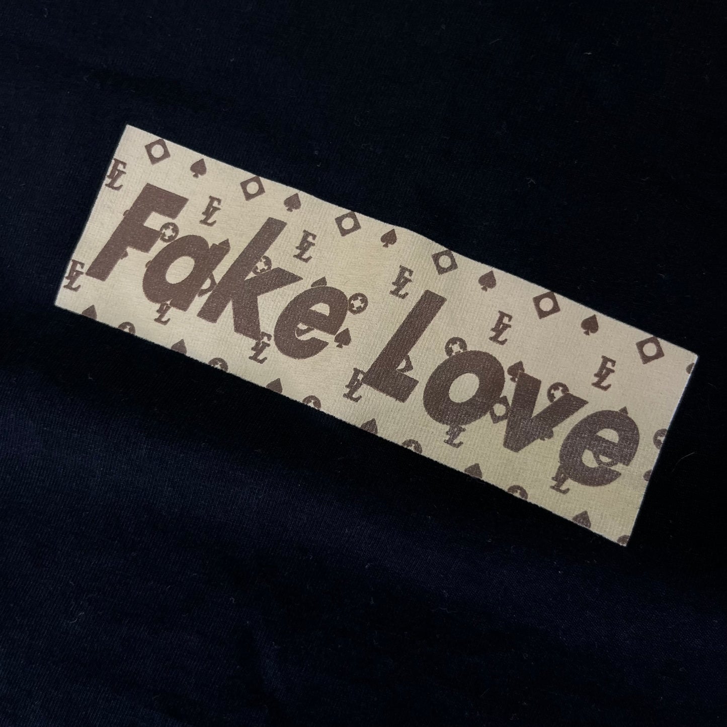 Mister Tee “Fake Love” Box Logo Graphic T-Shirt